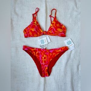 Dippin’ Daisy’s Zen top and Nocturnal bottom in sungazer / red